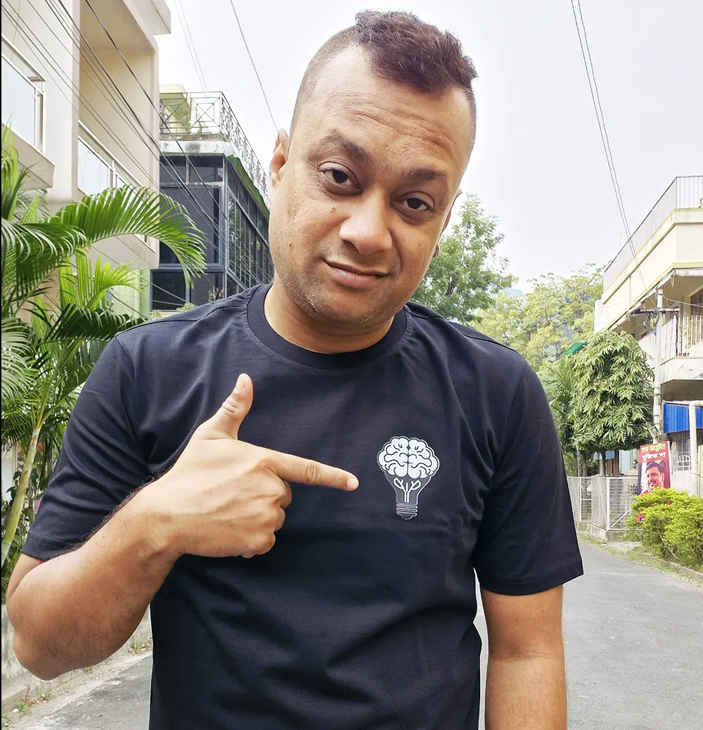 Man wearing Think Big T-shirt front view