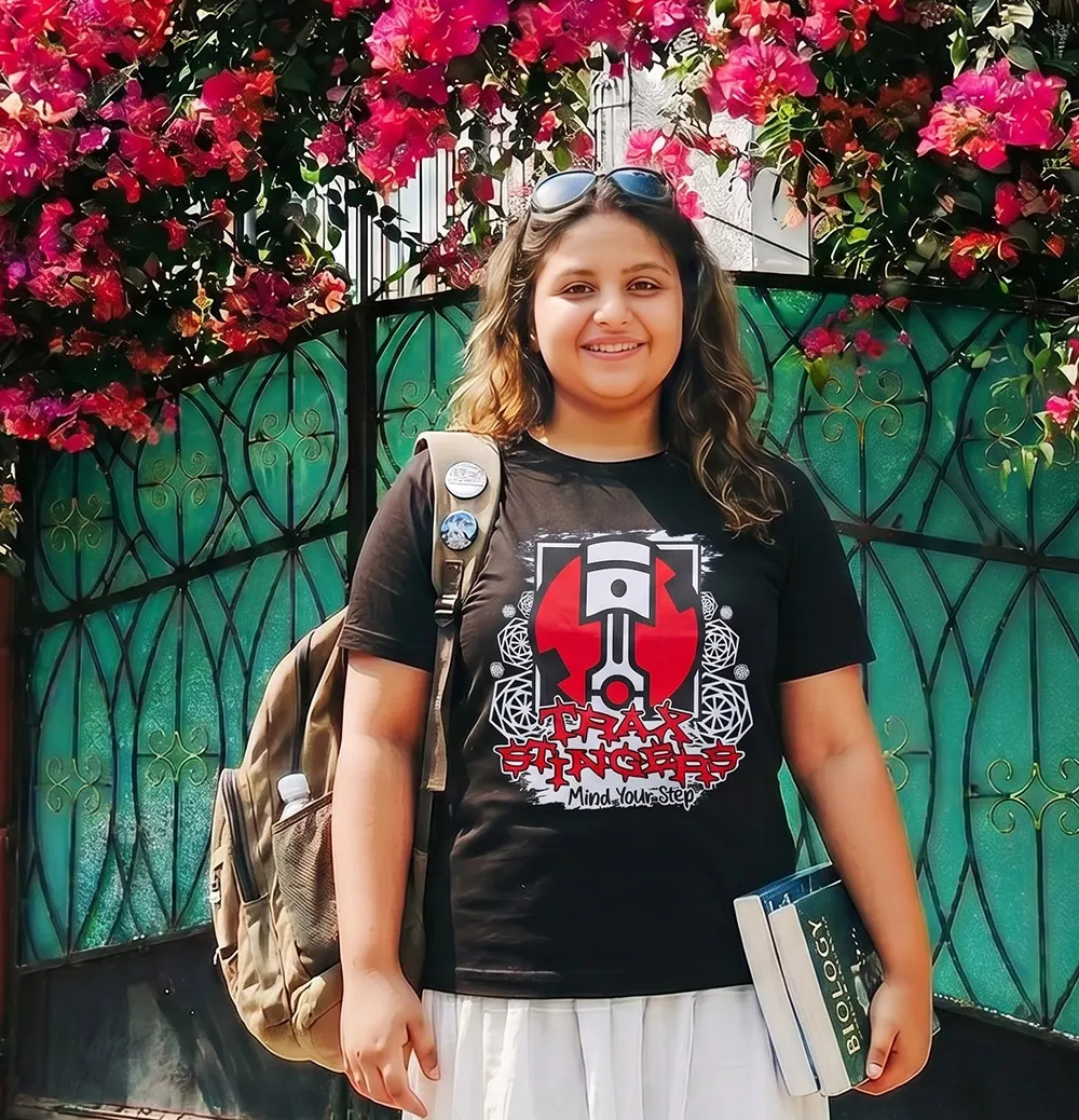 Girl wearing Gridlock T-shirt in a restaurant