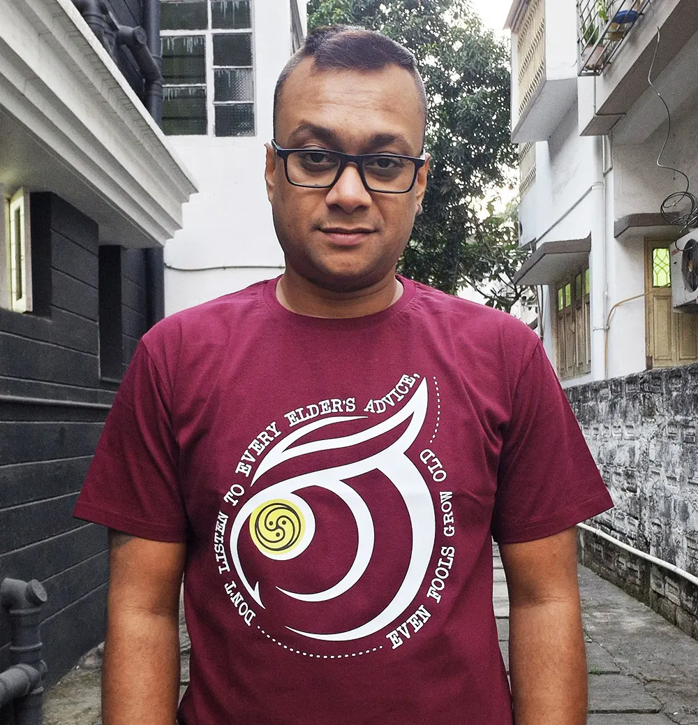 Guy wearing Wine Red Even Fools Grow Old T-shirt