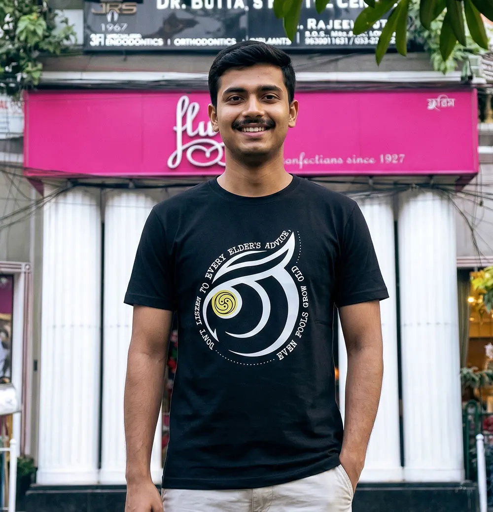 Guy wearing Black Even Fools Grow Old T-shirt