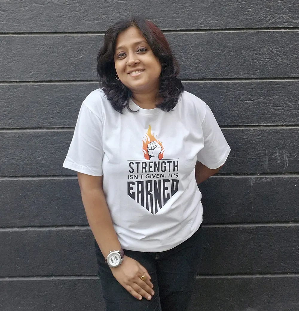 STRENGTH ISN'T GIVEN, IT'S EARNED Unisex T-Shirt for Woman