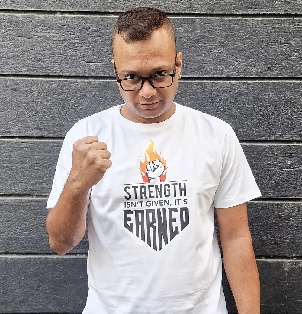 STRENGTH ISN'T GIVEN, IT'S EARNED Unisex T-Shirt for Man