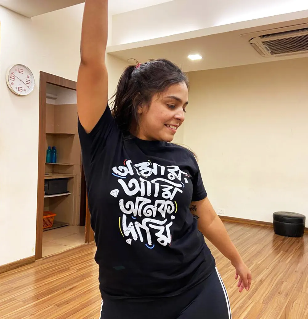 Woman wearing a Bengali funky quote T-shirt for Zumba