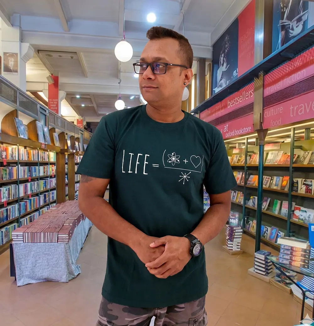 Man wearing Mad Genius t-shirt